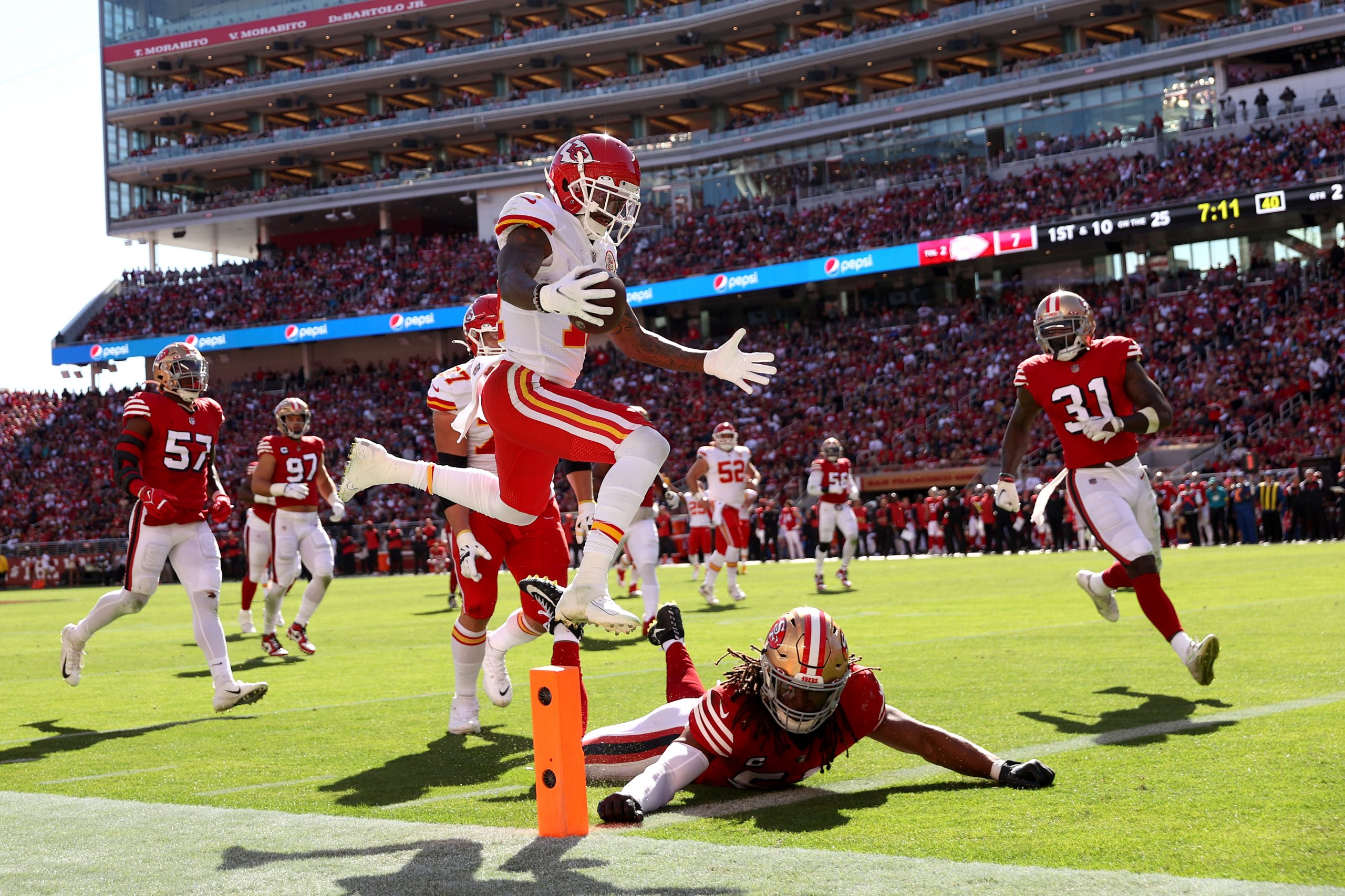 Mecole Hardman #17 of the Kansas City Chiefs scores a touchdown in the second quarter against the S...