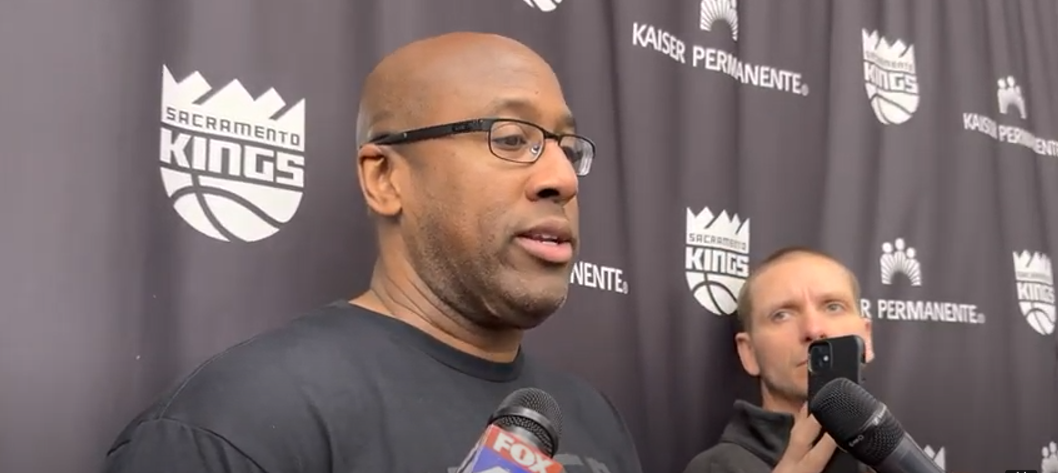 Kings coach Mike Brown talks to the media after Tuesday's practice....