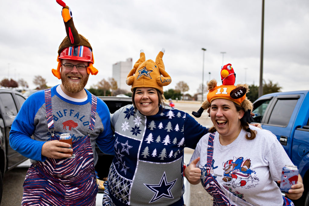Fans of the Dallas Cowboys and the Buffalo Bills enjoy their Thanksgiving Day while tailgating befo...
