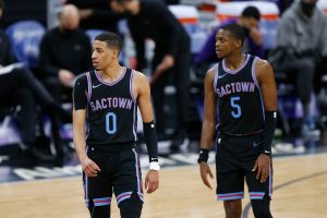 SACRAMENTO, CALIFORNIA - FEBRUARY 18: Tyrese Haliburton #0 and De'Aaron Fox #5 of the Sacramento Kings look on in the second half against the Miami Heat at Golden 1 Center on February 18, 2021 in Sacramento, California. NOTE TO USER: User expressly acknowledges and agrees that, by downloading and/or using this photograph, user is consenting to the terms and conditions of the Getty Images License Agreement. (Photo by Lachlan Cunningham/Getty Images)