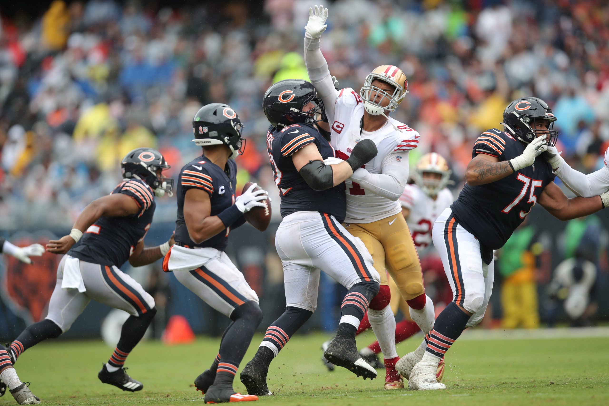 Arik Armstead #91 of the San Francisco 49ers pressures Justin Fields #1 of the Chicago Bears during...