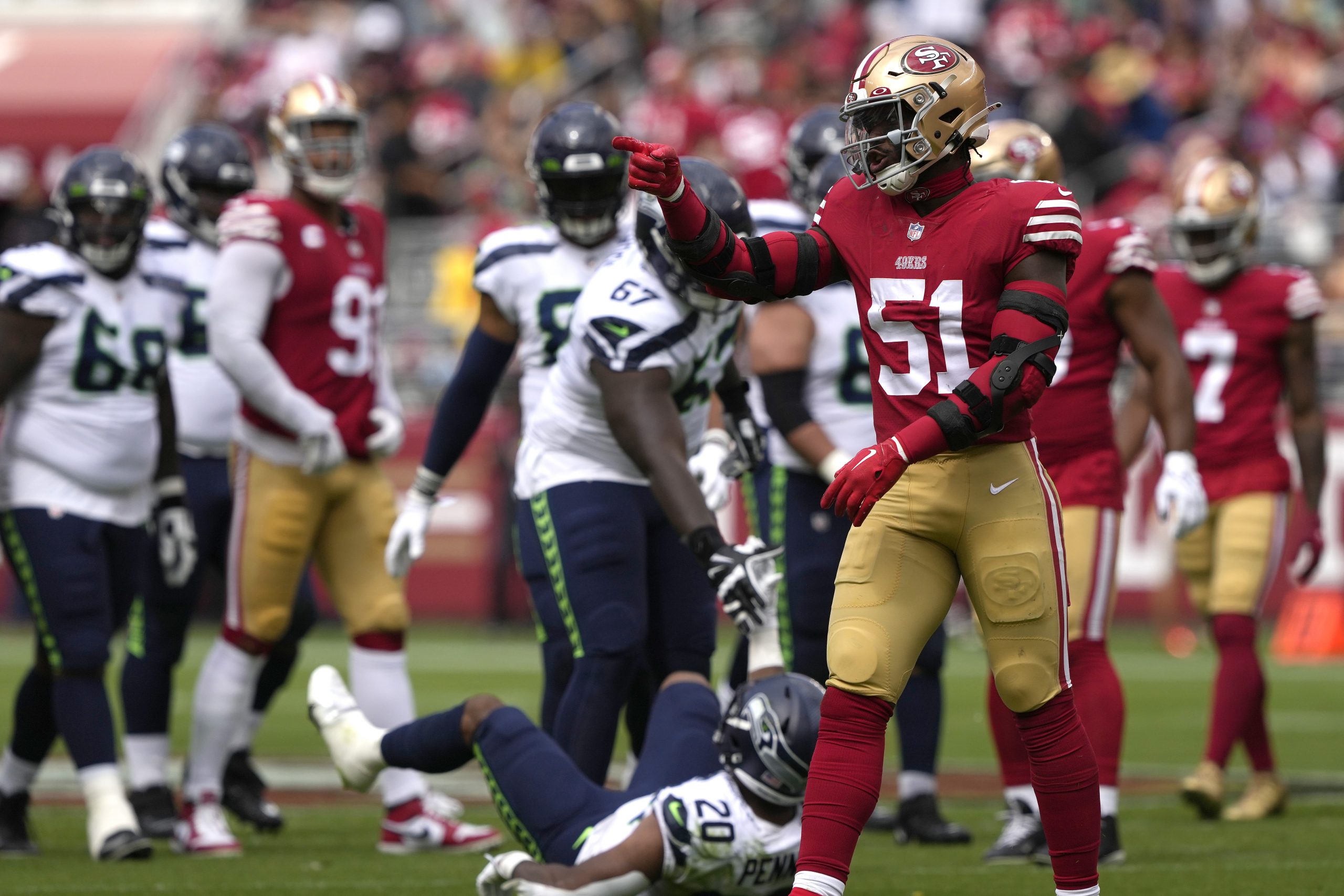 Azeez Al-Shaair #51 of the San Francisco 49ers reacts after making a tackle against the Seattle Sea...
