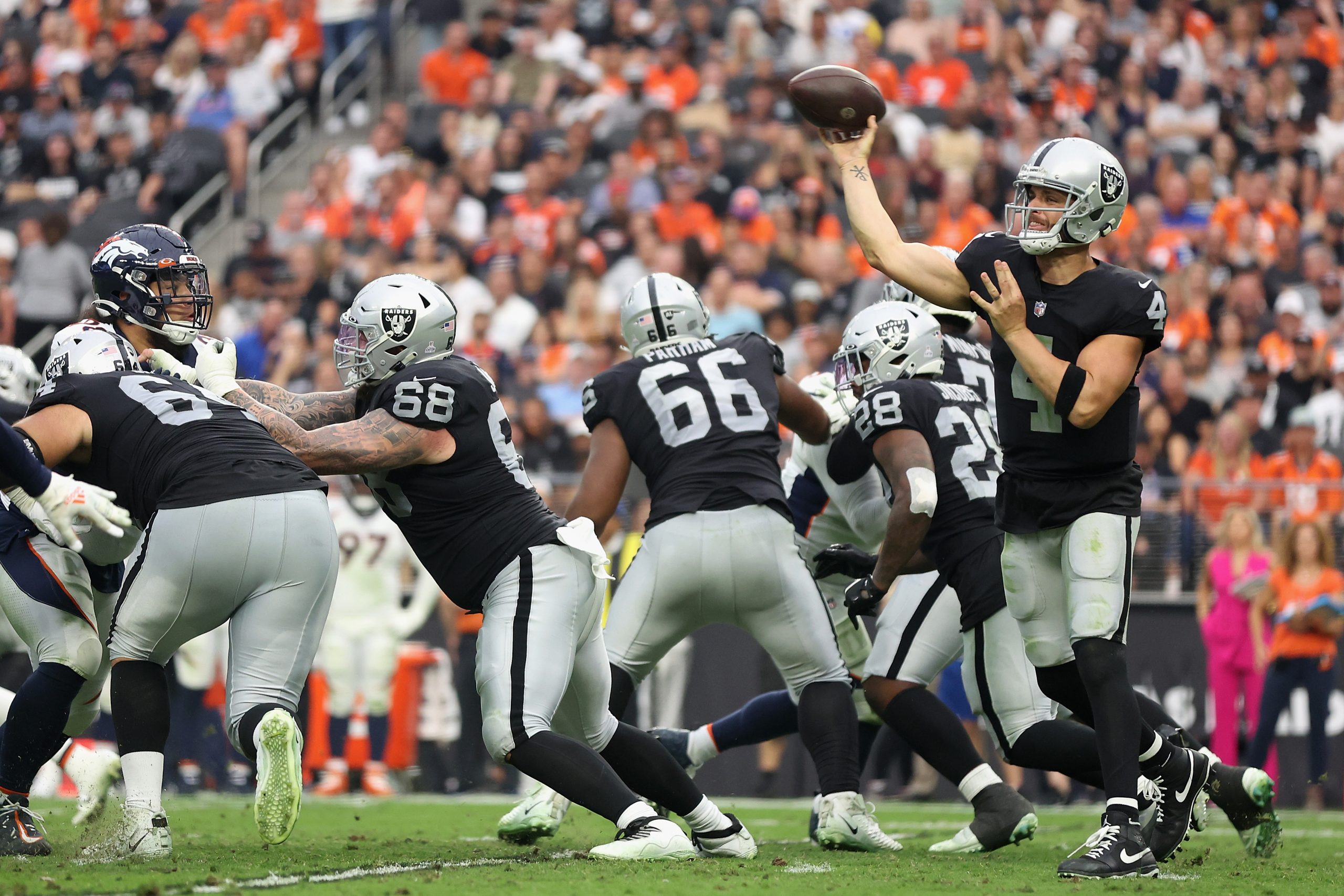 Quarterback Derek Carr #4 of the Las Vegas Raiders throws a pass during the NFL game at Allegiant S...