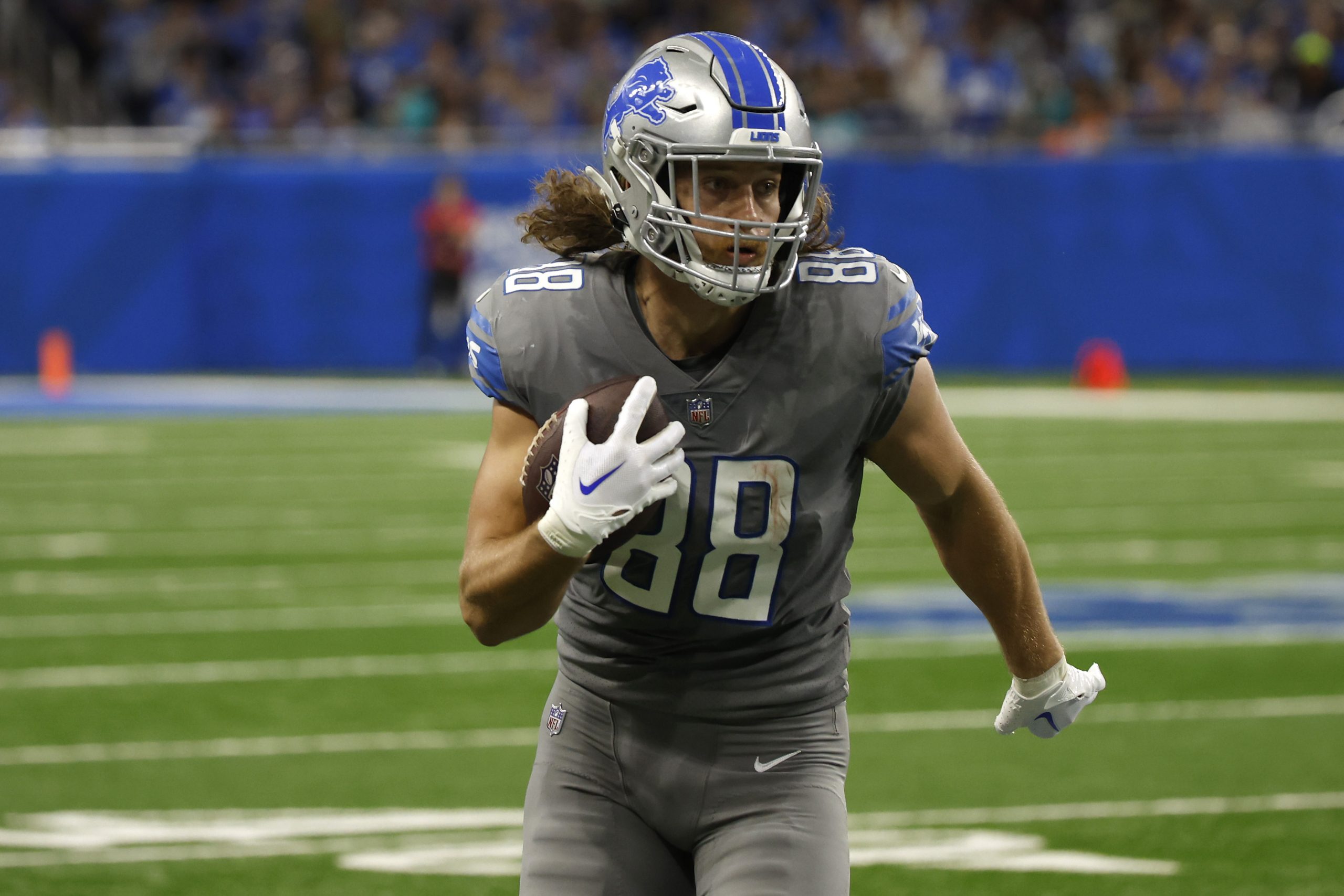 T.J. Hockenson #88 of the Detroit Lions runs for a first down during the second quarter against the...