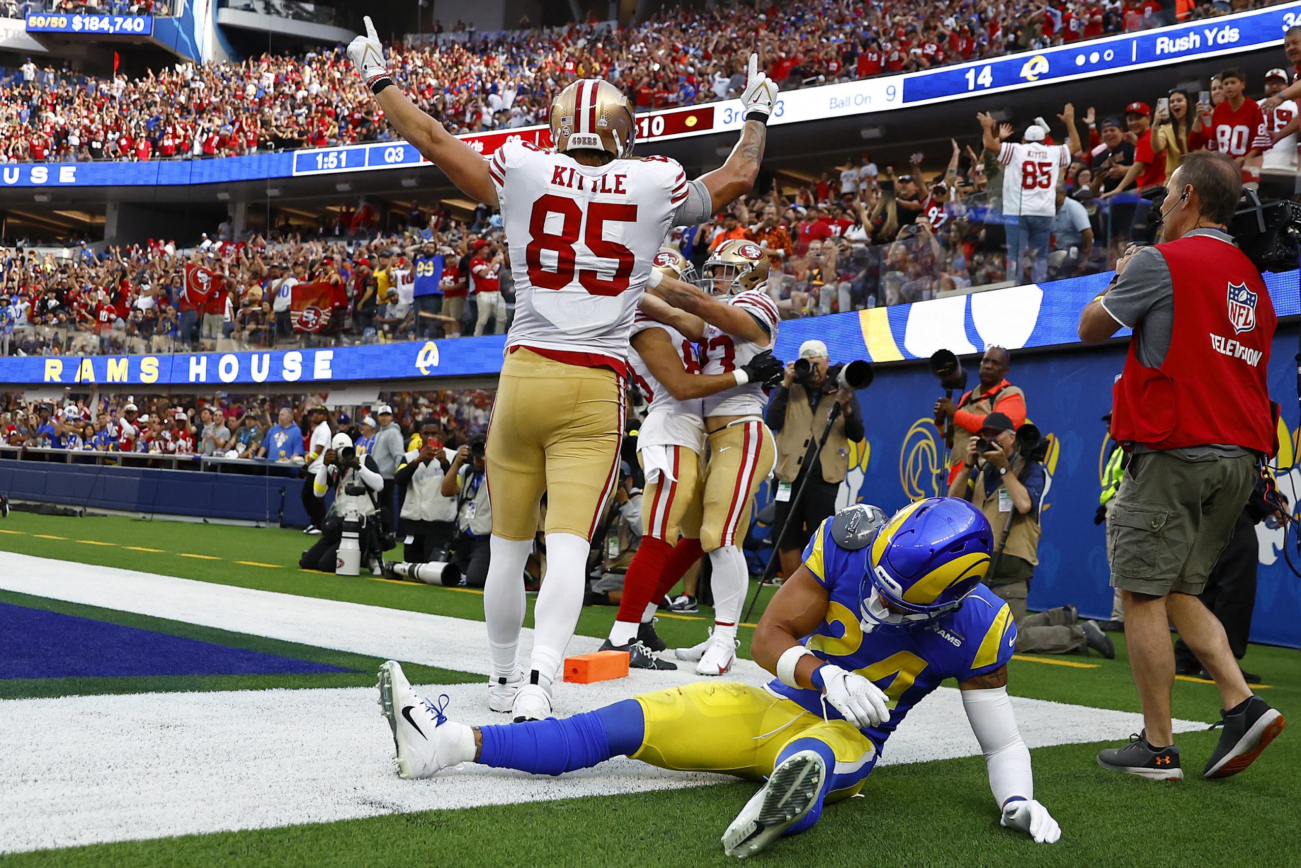 Christian McCaffrey #23 of the San Francisco 49ers celebrates a touchdown during the third quarter ...
