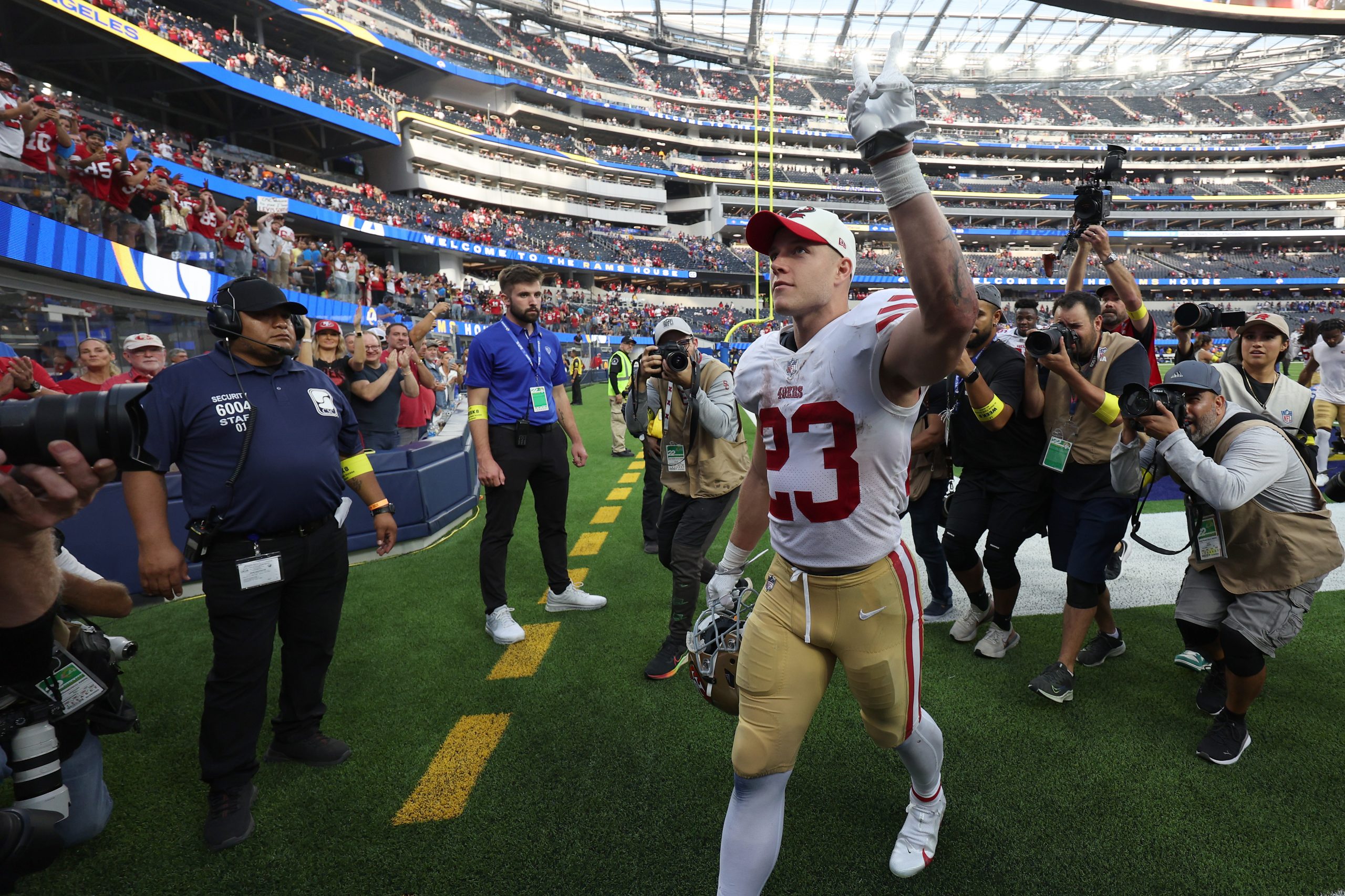 Christian McCaffrey #23 of the San Francisco 49ers celebrates after a game against the Los Angeles ...