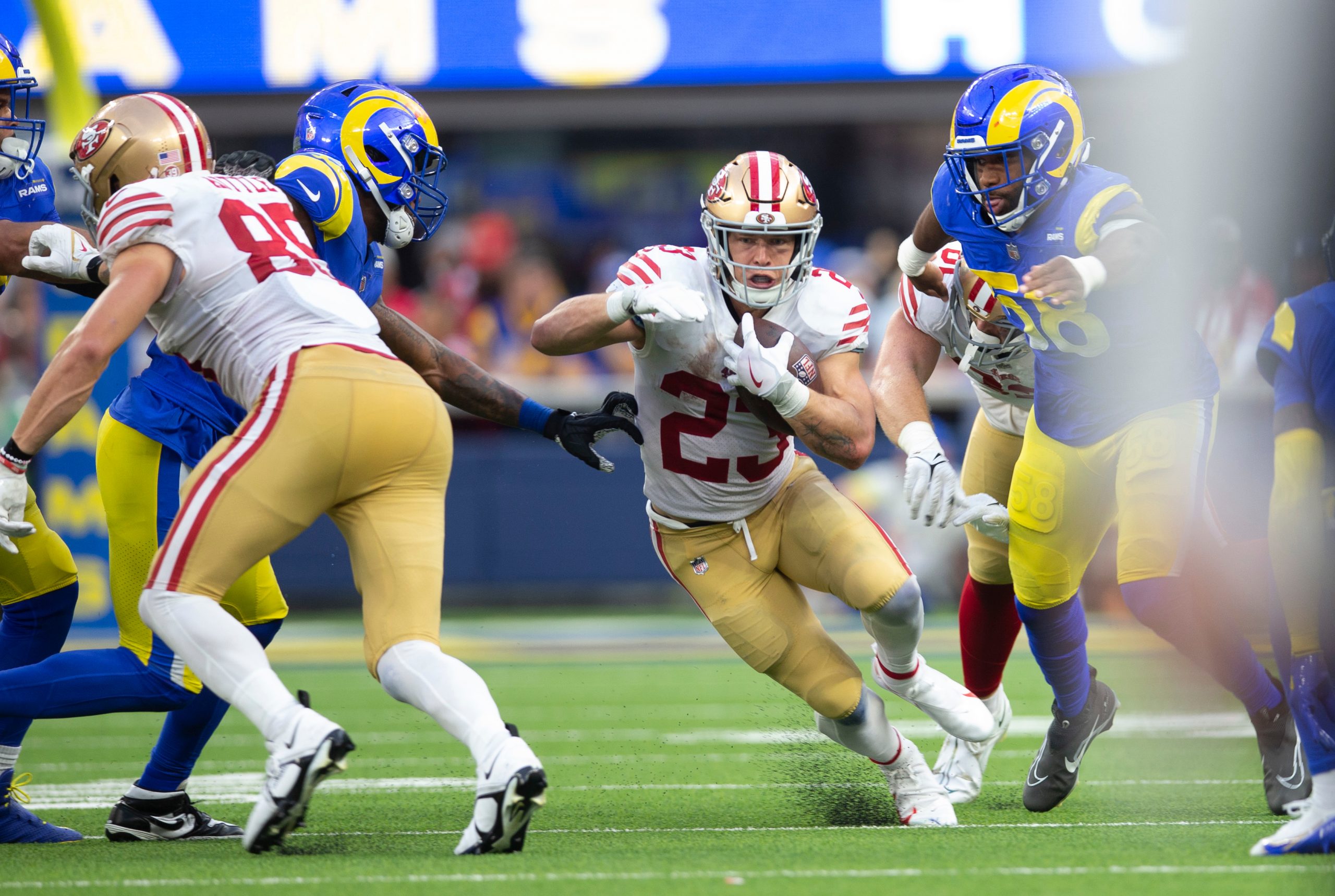 Christian McCaffrey #23 of the San Francisco 49ers rushes during the game against the Los Angeles R...