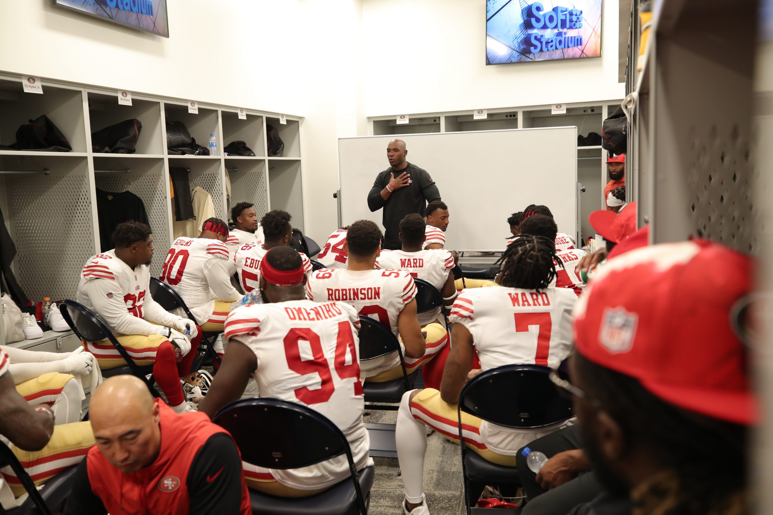Defensive Coordinator DeMeco Ryans of the San Francisco 49ers talks to the defense in the locker ro...