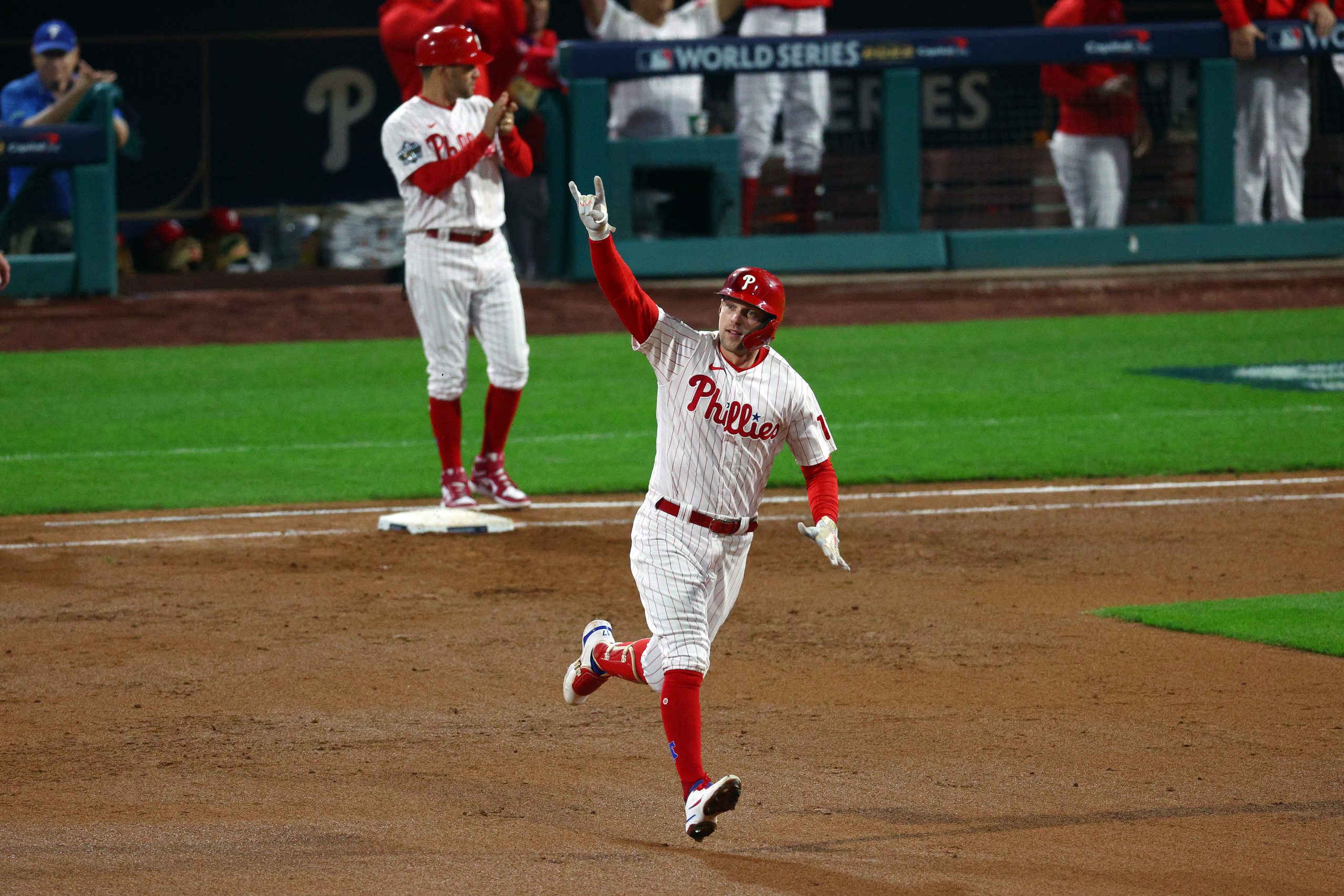 Rhys Hoskins, husband of Jayme Hoskins, rounds the bases after hitting a home run against the Houst...