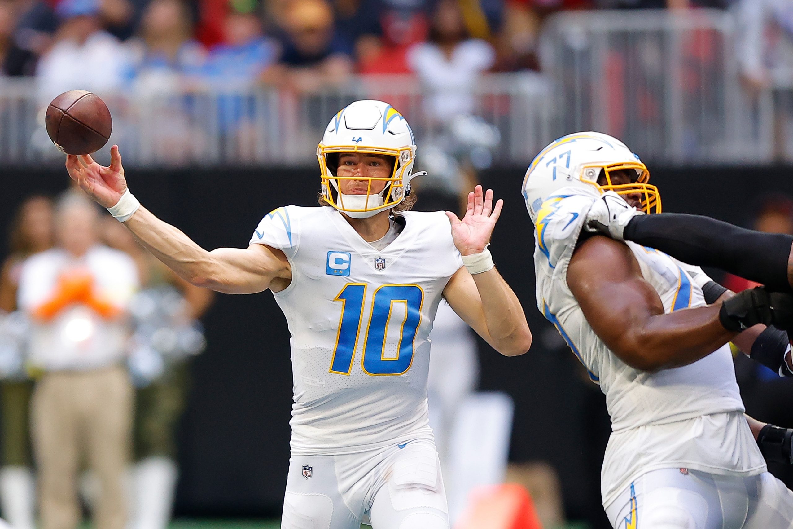 Justin Herbert #10 of the Los Angeles Chargers passes the ball during the fourth quarter in the gam...