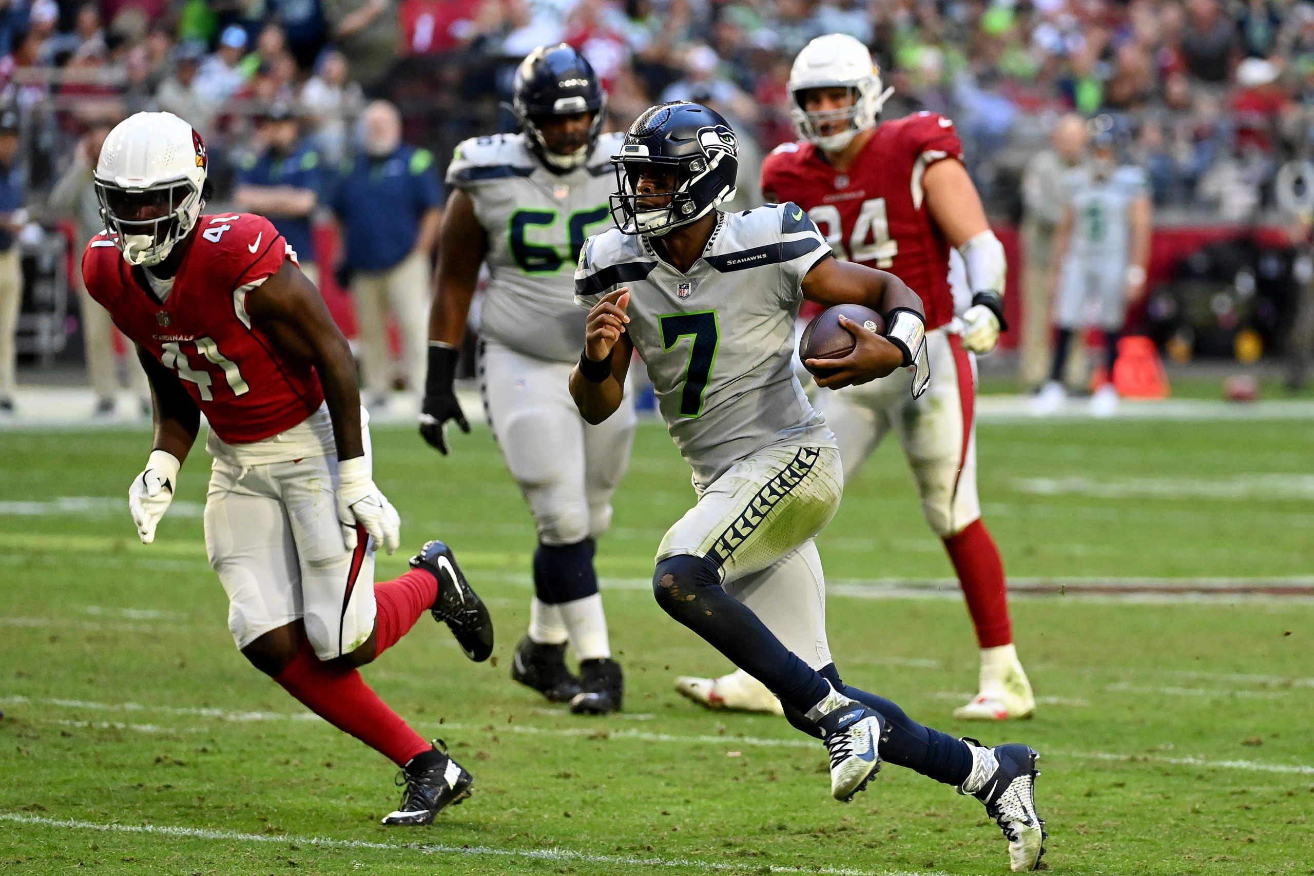 Geno Smith #7 of the Seattle Seahawks runs the ball during the fourth quarter of the game against t...