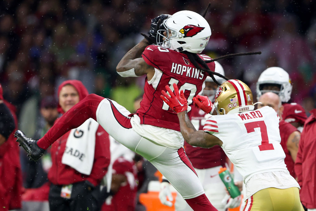 DeAndre Hopkins #10 of the Arizona Cardinals makes a catch over Charvarius Ward #7 of the San Franc...