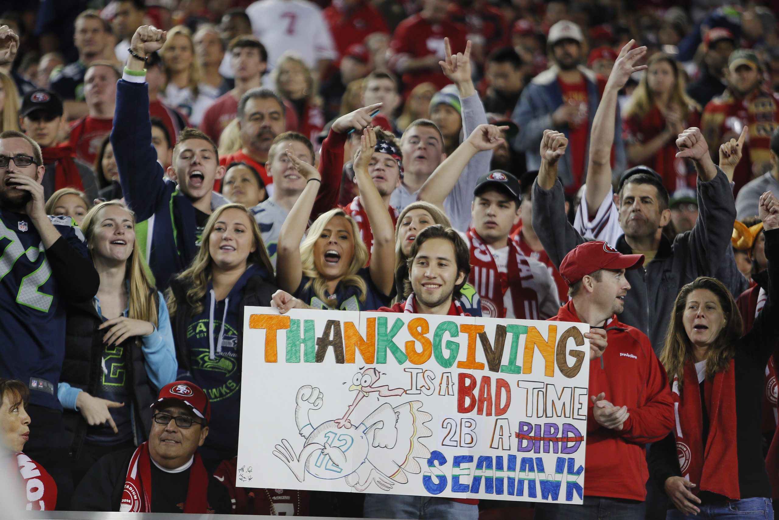 Thanksgiving Seattle Seahawks and San Francisco 49ers fans cheer on their teams on November 27, 201...