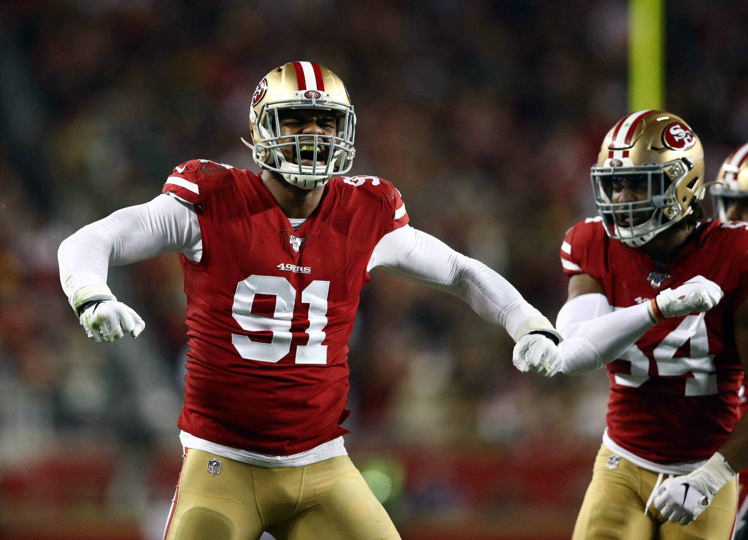 Defensive end Arik Armstead #91 of the San Francisco 49ers reacts after making a stop during the fi...