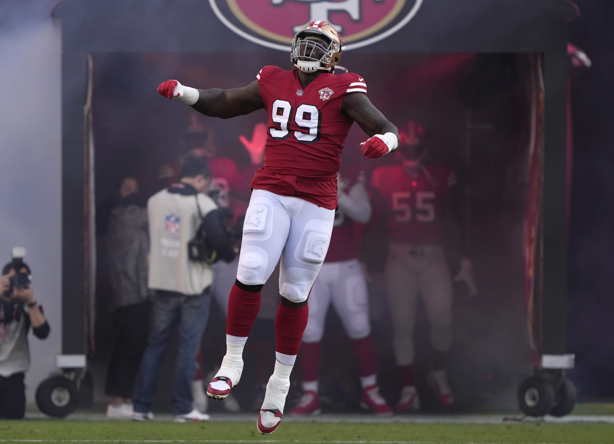Javon Kinlaw #99 of the San Francisco 49ers takes the field prior to a game against the Green Bay P...