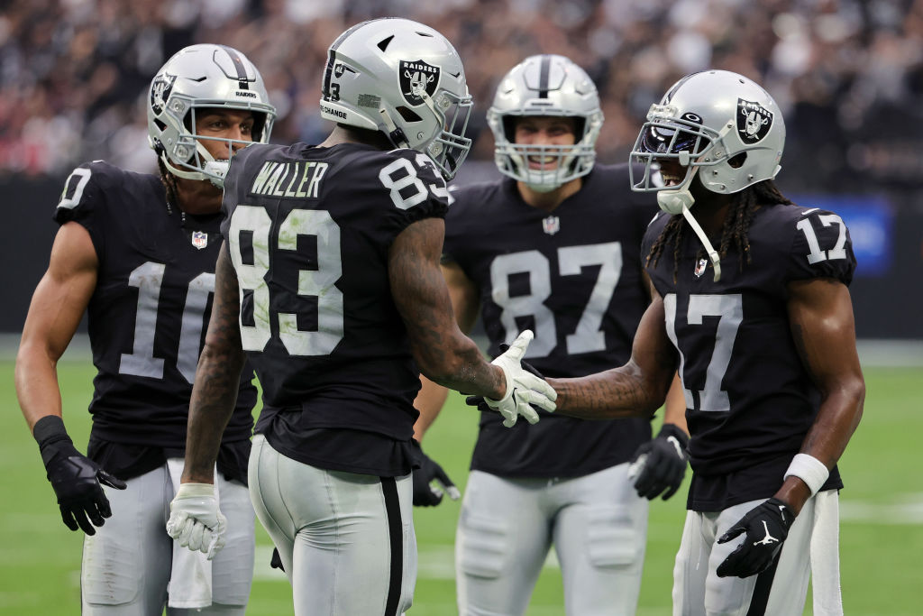 Tight end Darren Waller #83 of the Las Vegas Raiders celebrates his touchdown with wide receiver Ma...