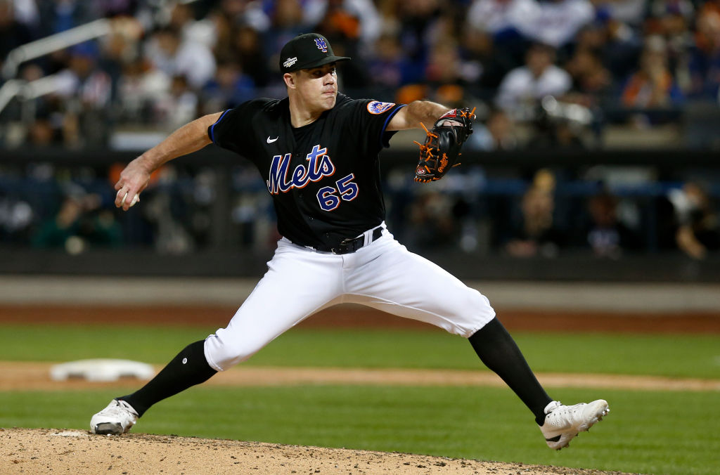 Trevor May #65 of the New York Mets in action against the San Diego Padres during game one of the N...