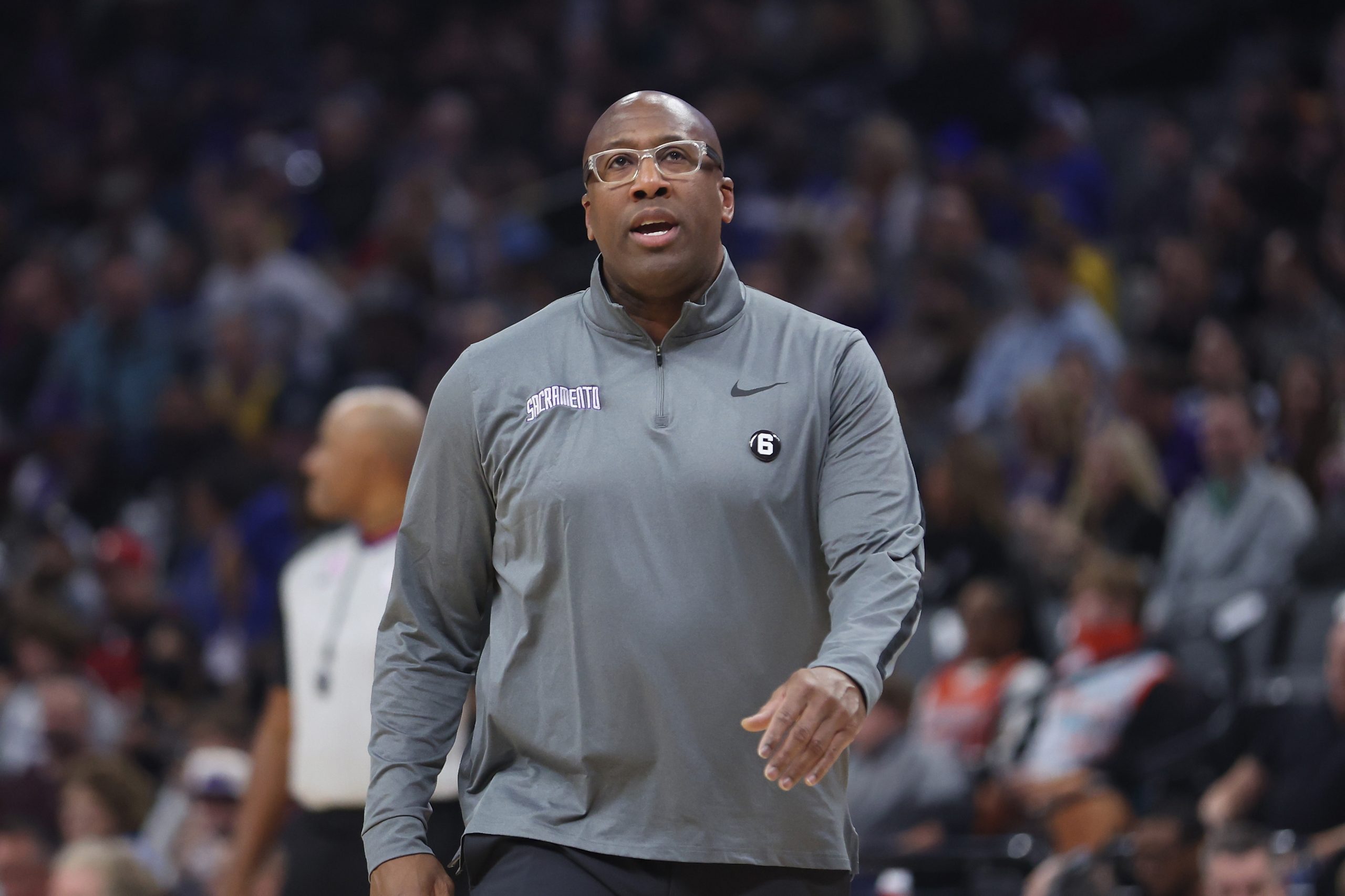 Mike Brown, head coach of the Sacramento Kings, looks on during a game....