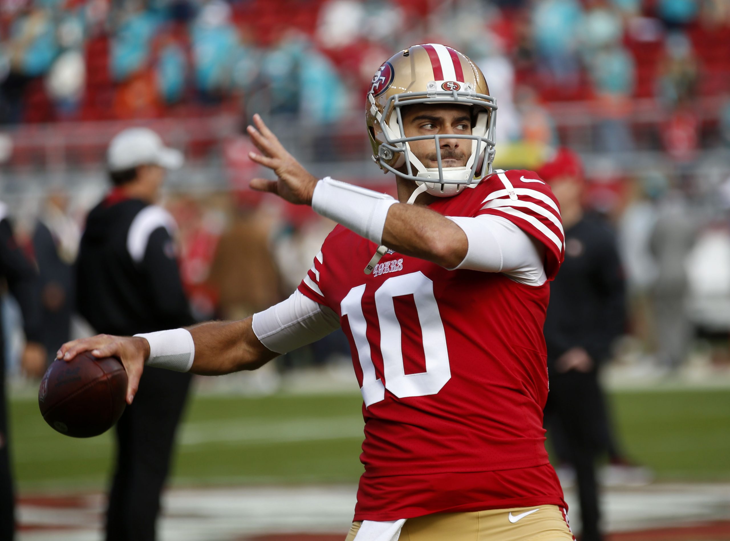 San Francisco 49ers quarterback Jimmy Garoppolo #10 warms up before their game against the Miami Do...