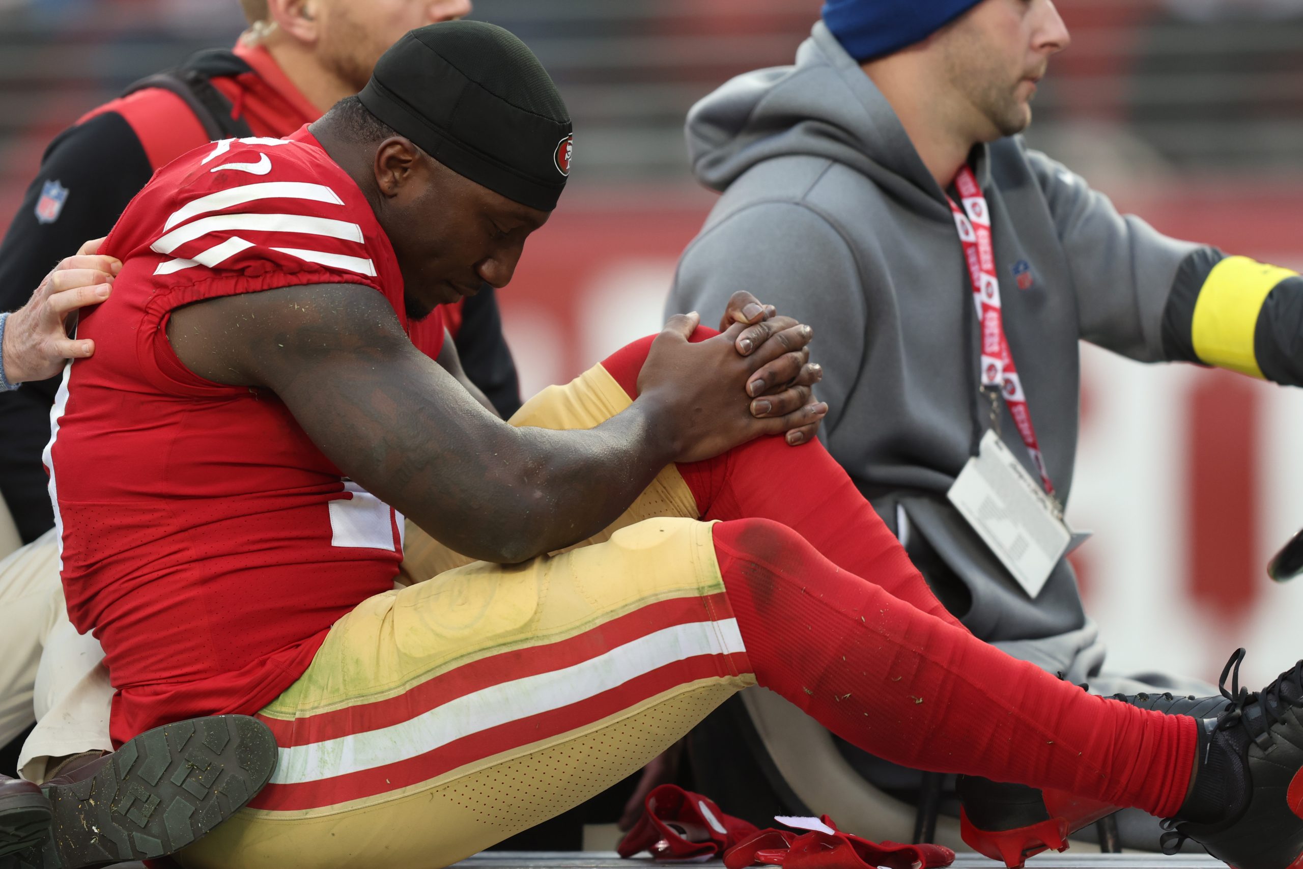 Deebo Samuel #19 of the San Francisco 49ers is taken off the field on a cart after being injured du...