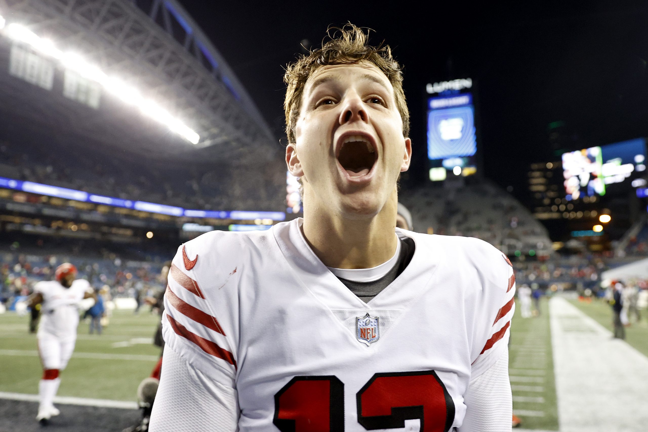 Brock Purdy #13 of the San Francisco 49ers reacts after beating the Seattle Seahawks 21-13 at Lumen...