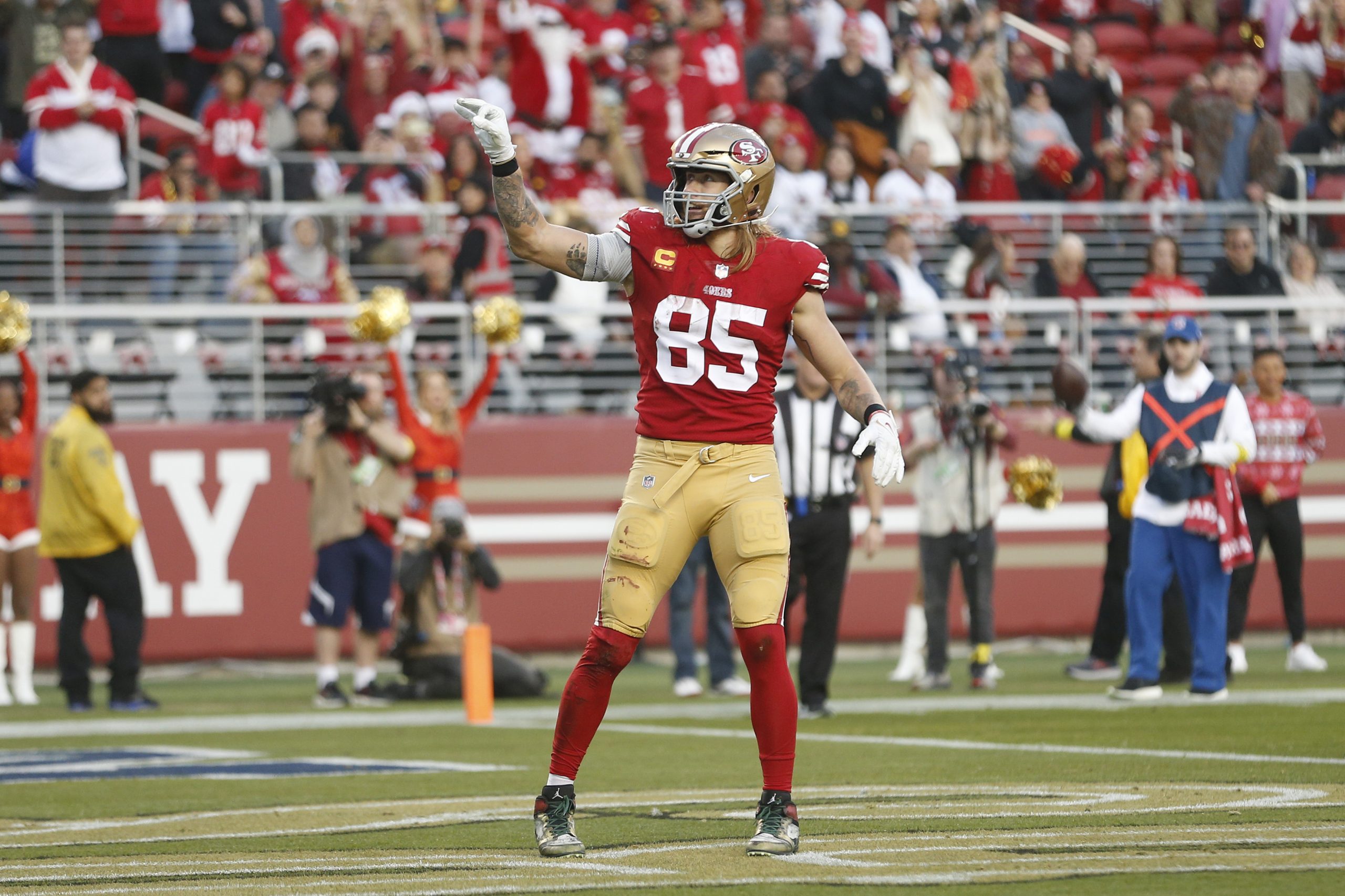 George Kittle #85 of the San Francisco 49ers reacts after a play during the second half in the game...