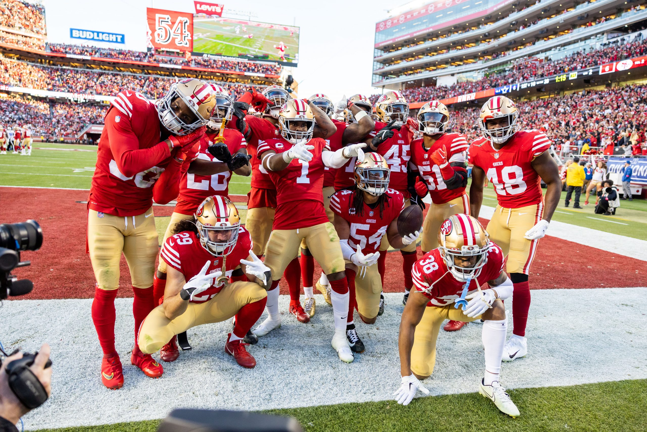 The San Francisco defense celebrates an interception during the NFL NFC Divisional Playoff game bet...
