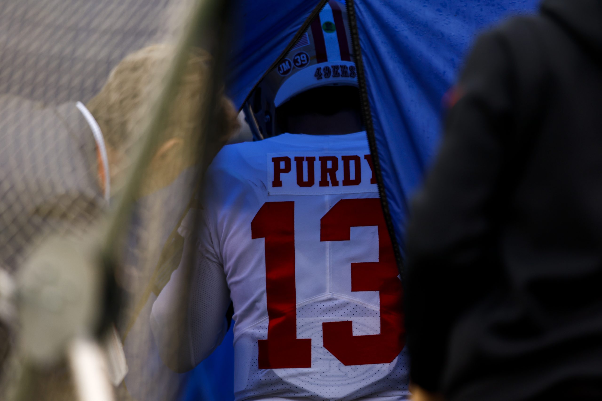Brock Purdy #13 of the San Francisco 49ers walks into the medical tent on the sidelines after suffe...