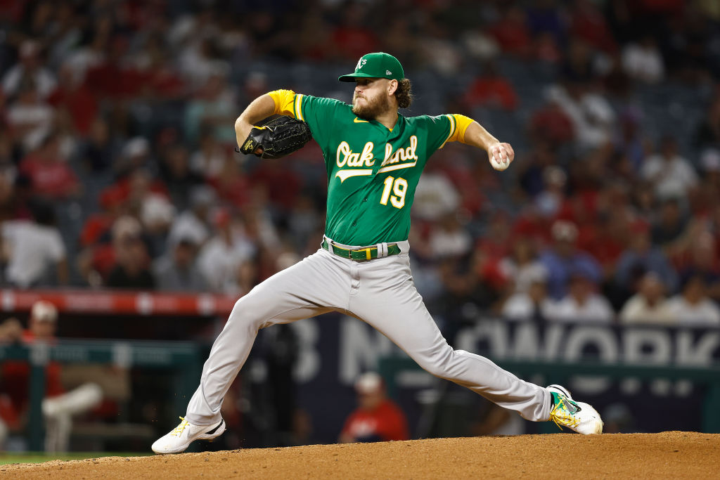 Cole Irvin #19 of the Oakland Athletics pitches against the Los Angeles Angels during the second in...