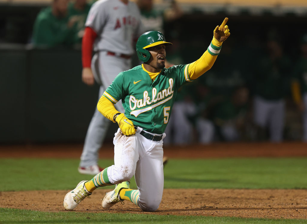 Tony Kemp #5 of the Oakland A's scores on a single by Seth Brown #15 in the bottom of the eighth in...