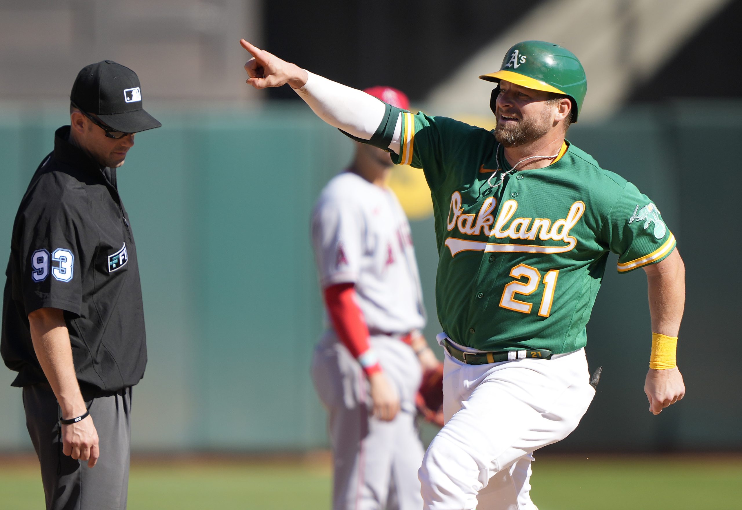 Stephen Vogt #21 of the Oakland Athletics celebrates while trotting around the bases after hitting ...