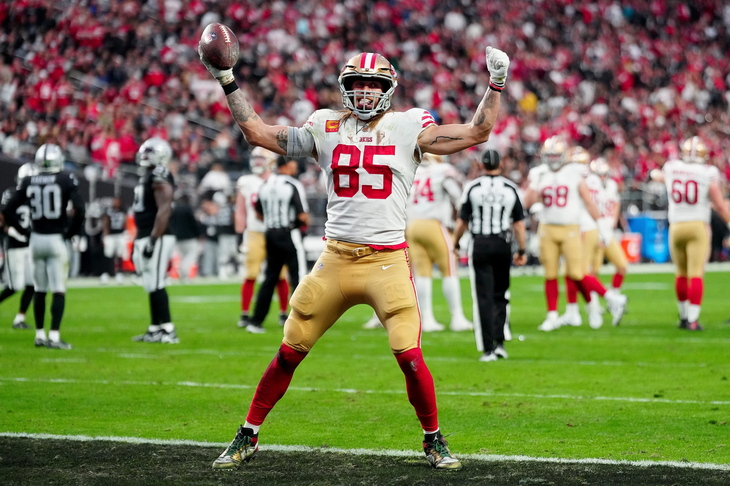 George Kittle #85 of the San Francisco 49ers celebrates a touchdown against the Las Vegas Raiders d...