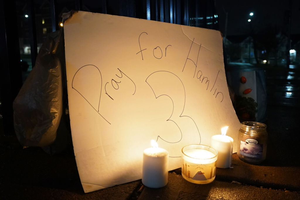 A vigil is displayed at the University of Cincinnati Medical Center for NFL player Damar Hamlin of ...