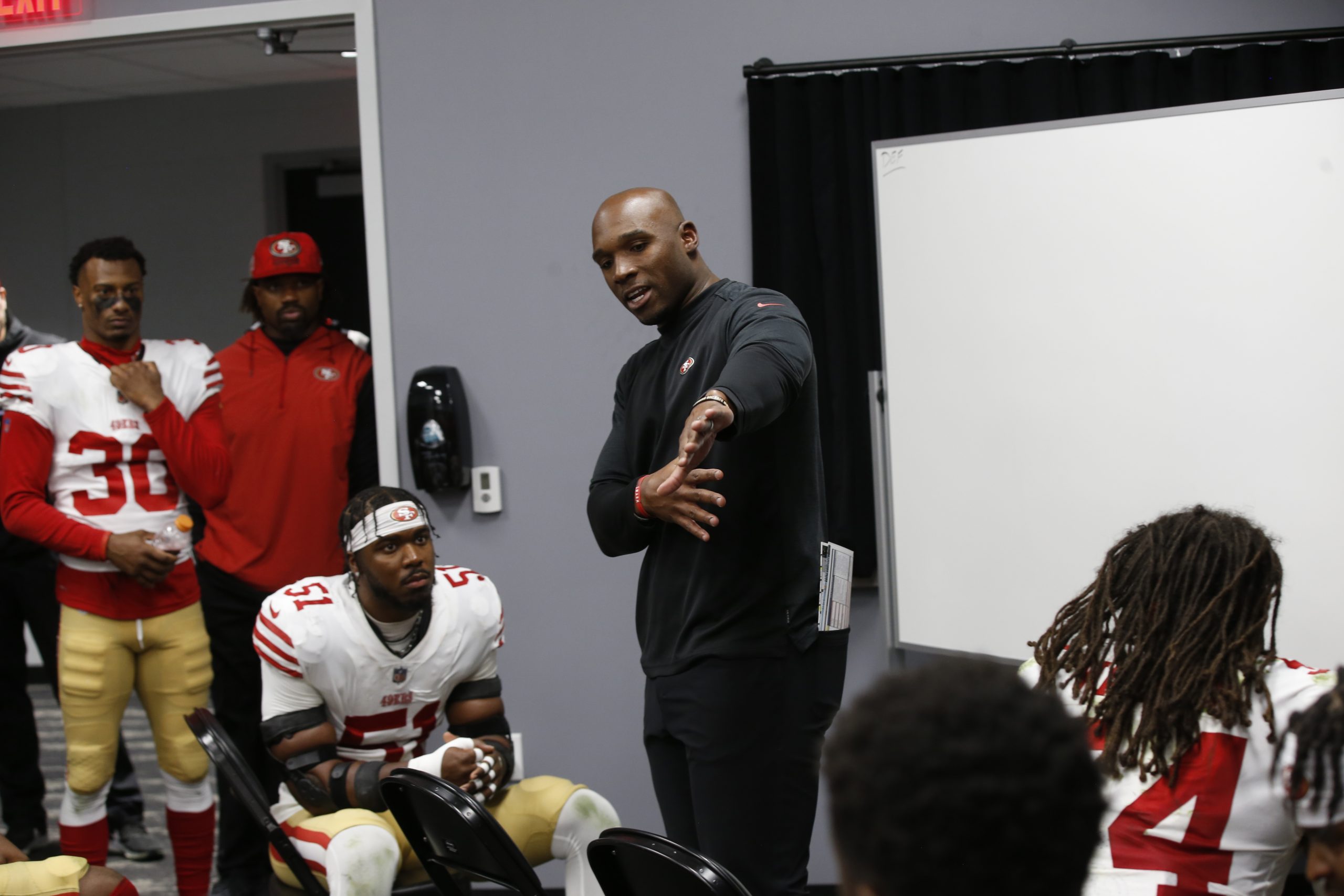 Defensive Coordinator DeMeco Ryans of the San Francisco 49ers in the locker room during halftime of...