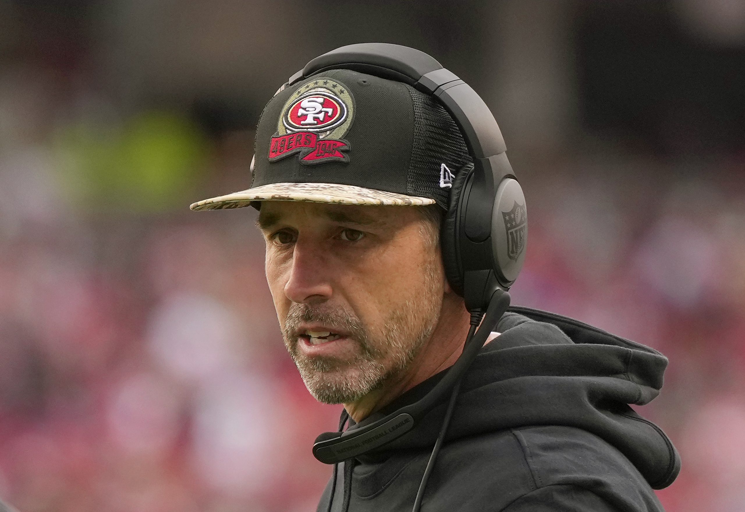 Head coach Kyle Shanahan of the San Francisco 49ers looks on from the sidelines in the first half d...