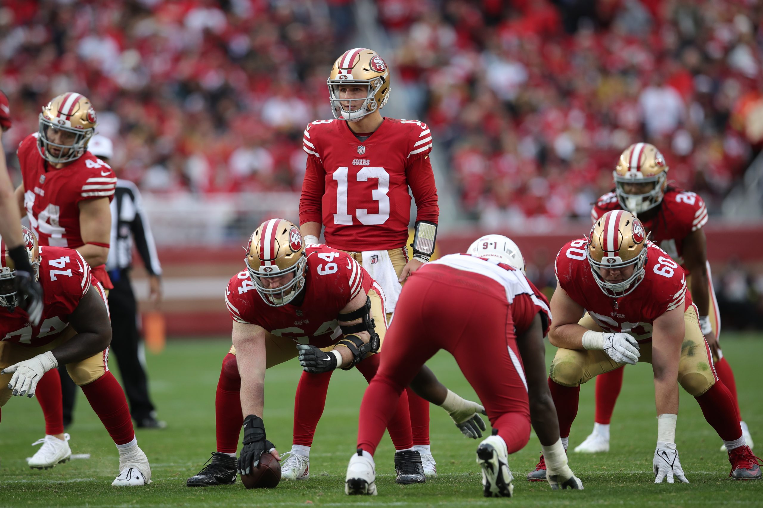 Brock Purdy #13 of the San Francisco 49ers lines up before the snap during the game against the Ari...
