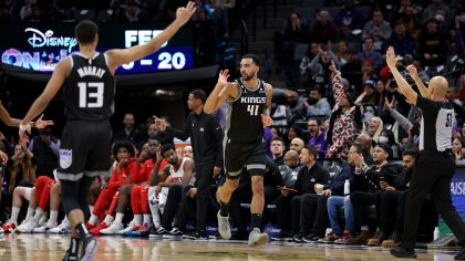SACRAMENTO, CALIFORNIA - JANUARY 11: Keegan Murray #13 and Trey Lyles #41 of the Sacramento Kings react after Lyles made a three-point basket against the Houston Rockets in the second half at Golden 1 Center on January 11, 2023 in Sacramento, California. NOTE TO USER: User expressly acknowledges and agrees that, by downloading and or using this photograph, User is consenting to the terms and conditions of the Getty Images License Agreement. (Photo by Ezra Shaw/Getty Images)
