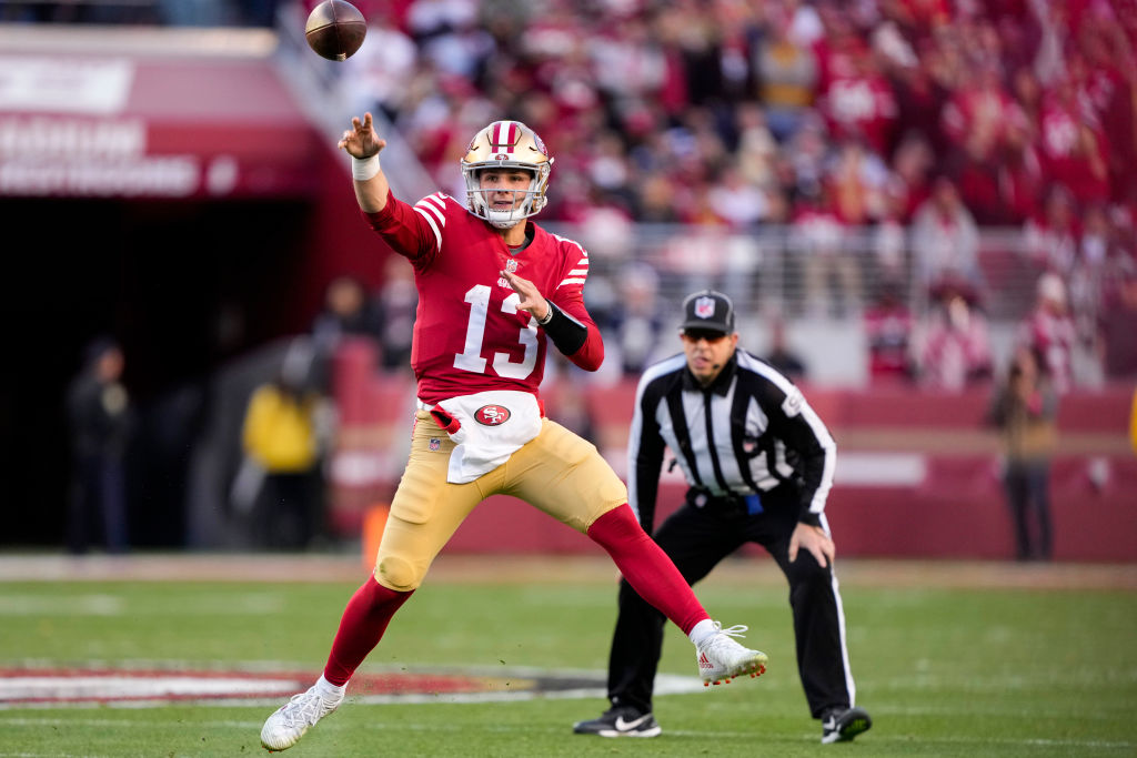 Brock Purdy #13 of the San Francisco 49ers throws a pass against the Dallas Cowboys during the firs...