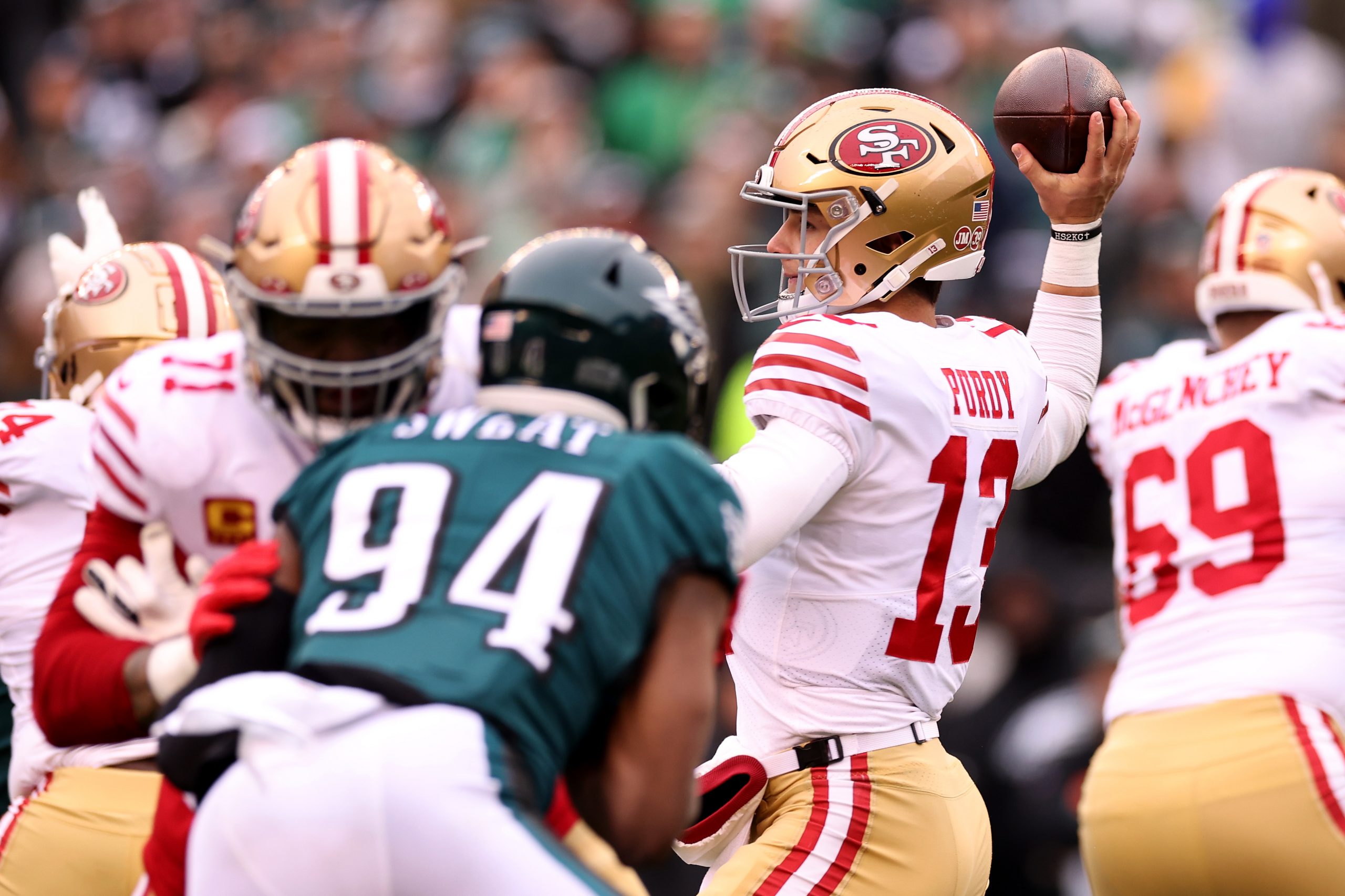 Brock Purdy #13 of the San Francisco 49ers throws a pass against the Philadelphia Eagles during the...