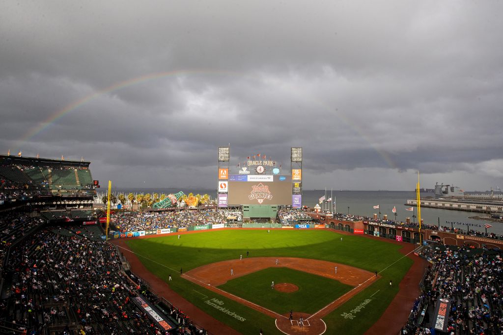 General view as a rainbow forms behind Oracle Park during the fourth inning between the San Francis...