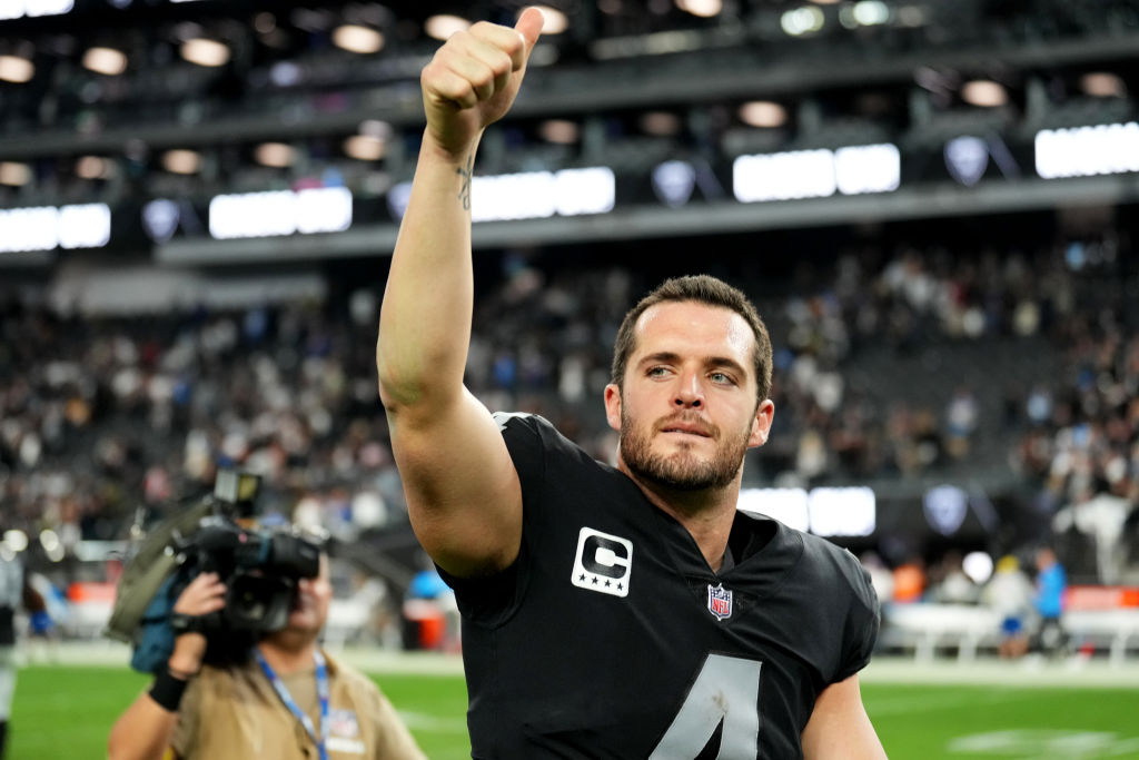 Derek Carr #4 of the Las Vegas Raiders celebrates after a game against the Los Angeles Chargers at ...
