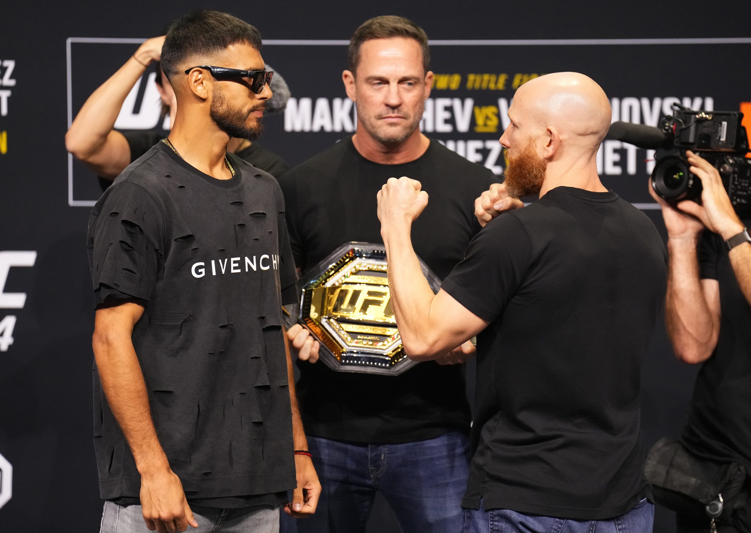 (L-R) Opponents Yair Rodriguez of Mexico and Josh Emmett face off during the UFC 284 press conferen...