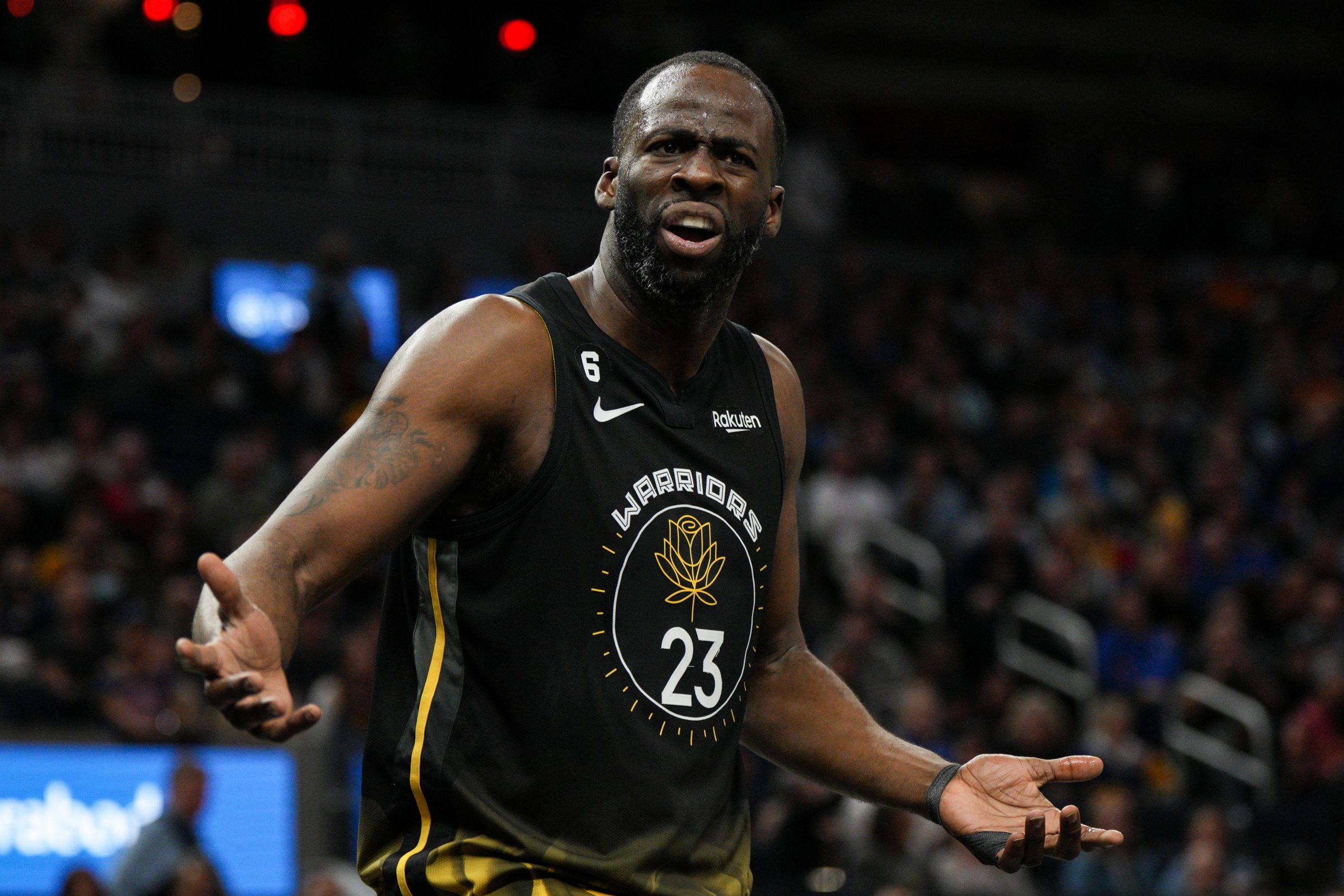Draymond Green #23 of the Golden State Warriors reacts to a call during the third quarter against t...