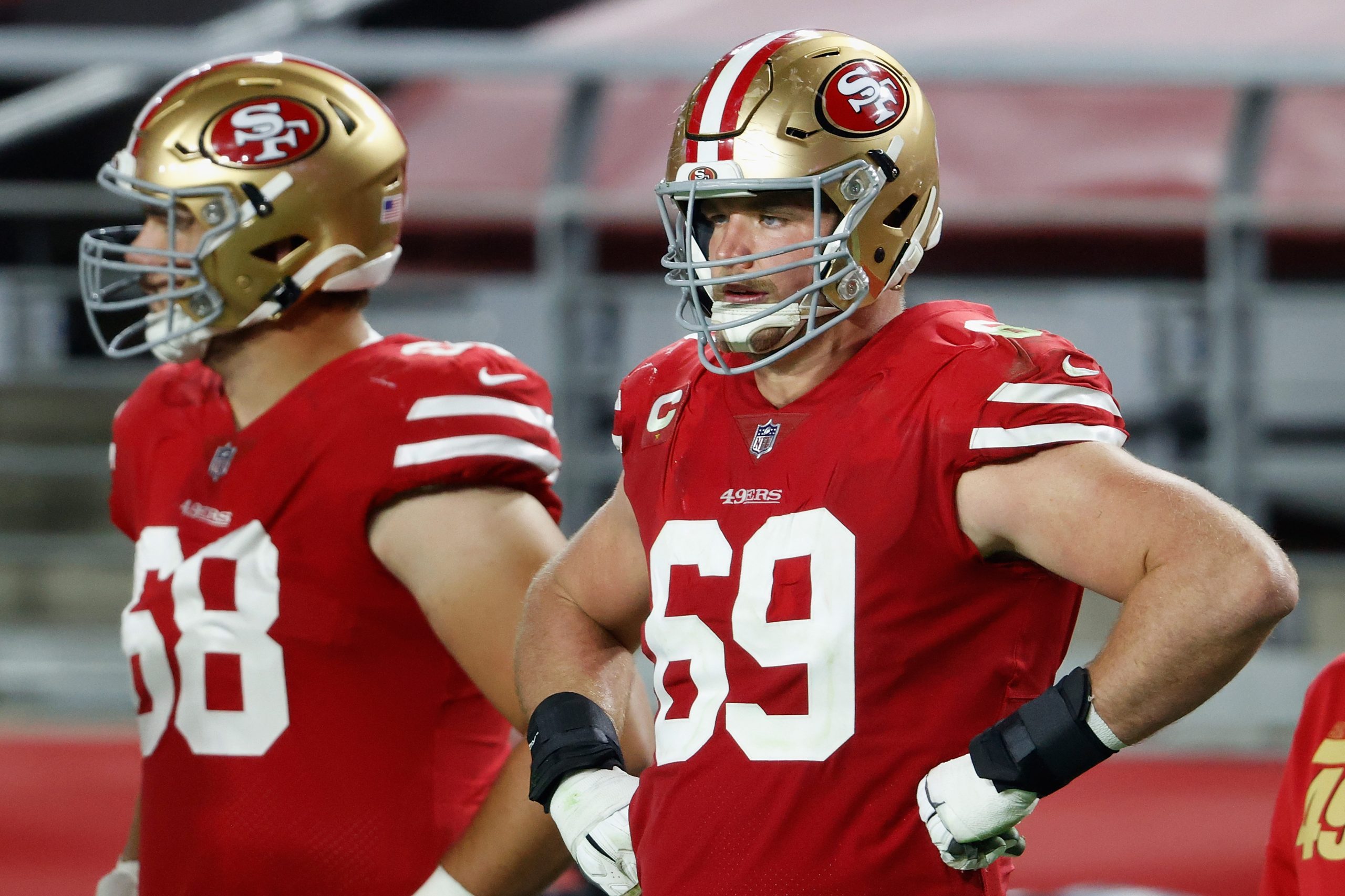 Offensive tackle Mike McGlinchey #69 of the San Francisco 49ers on the sidelines during the NFL gam...