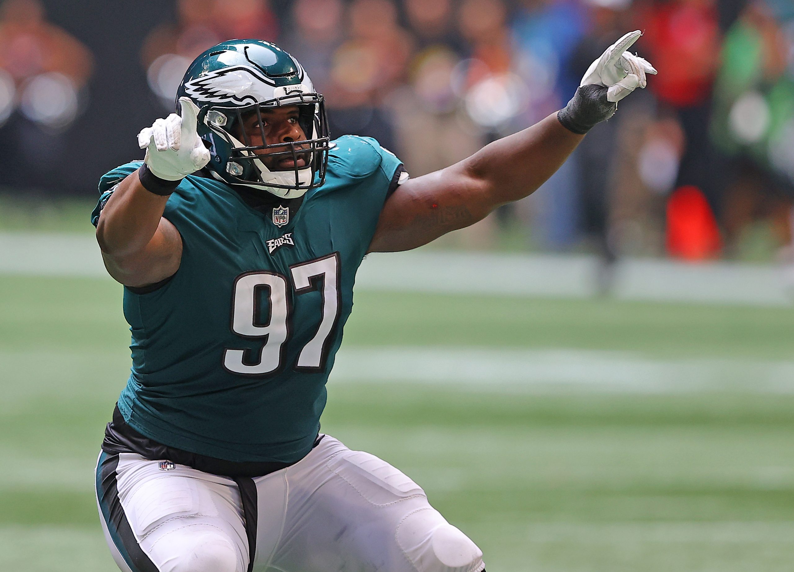 Javon Hargrave #97 of the Philadelphia Eagles reacts after a sack during the fourth quarter against...