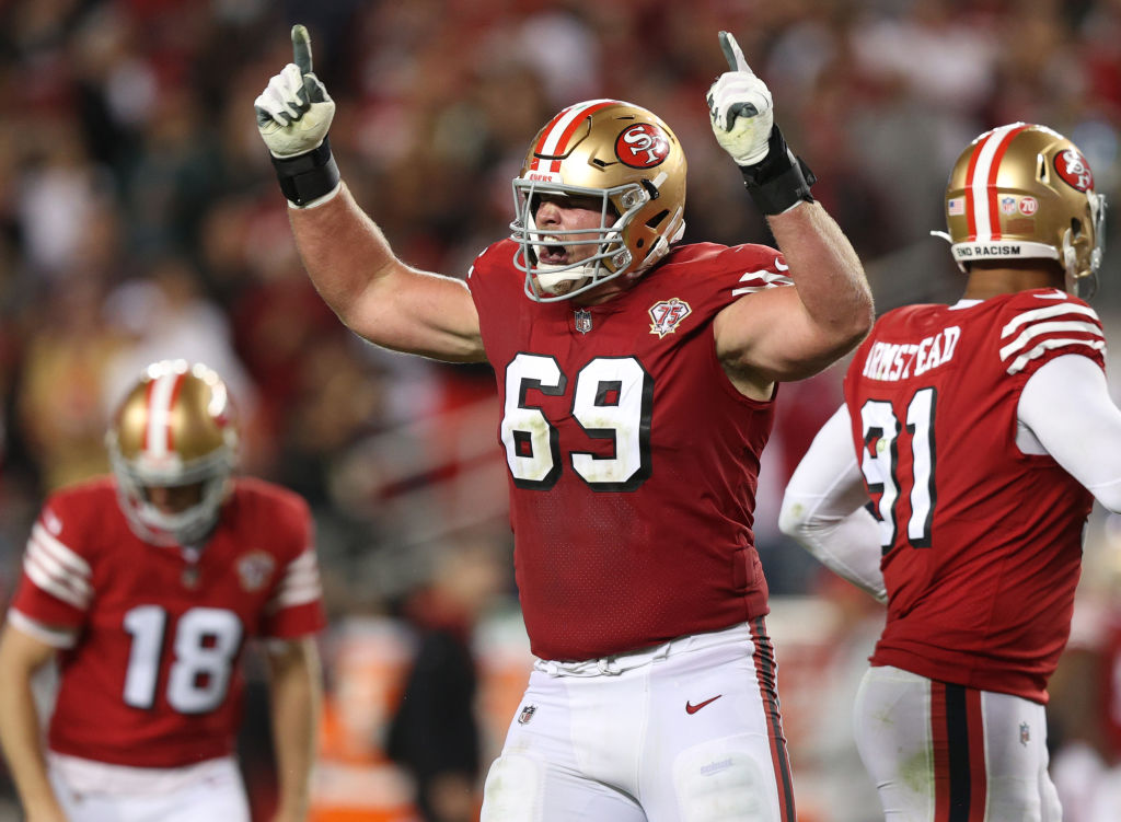 Mike McGlinchey #69 of the San Francisco 49ers celebrates after a touchdown during the fourth quart...