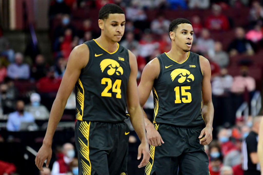 Kris Murray #24 and Keegan Murray #15 of the Iowa Hawkeyes look on during a game against the Ohio S...