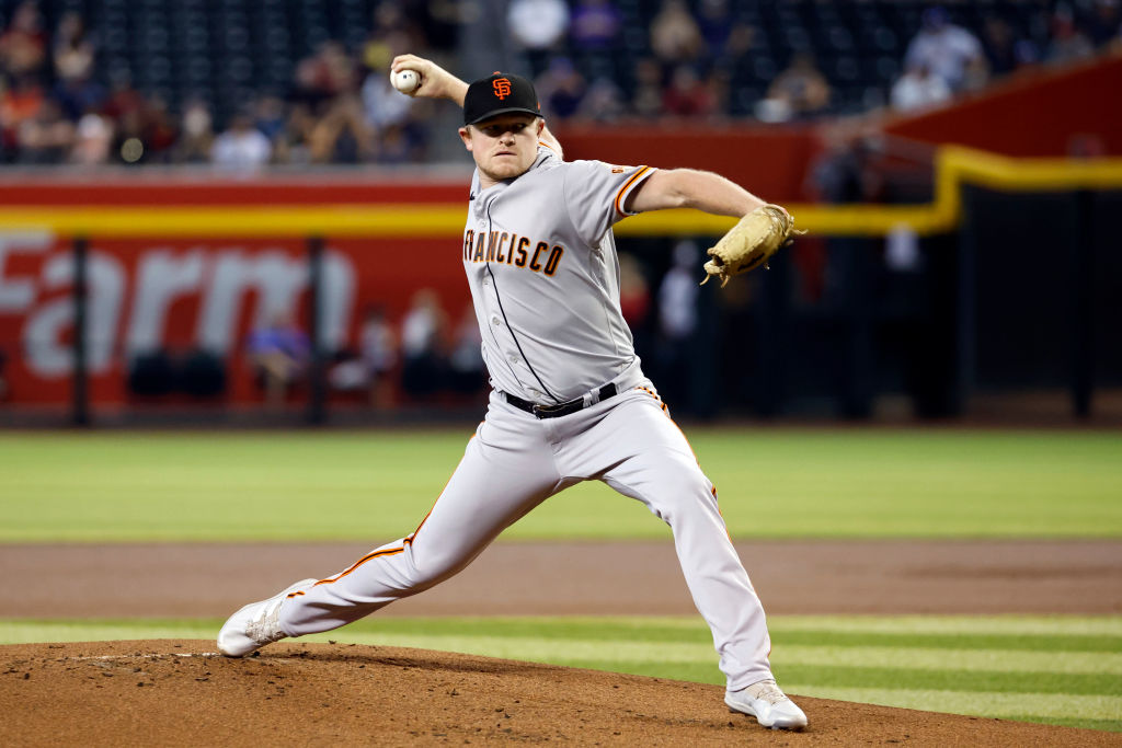 Starting pitcher Logan Webb #62 of the San Francisco Giants pitches during the first inning against...
