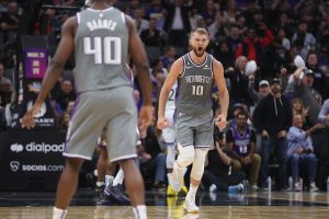 SACRAMENTO, CALIFORNIA - NOVEMBER 13: Domantas Sabonis #10 of the Sacramento Kings celebrates after a basket in the fourth quarter against the Golden State Warriors at Golden 1 Center on November 13, 2022 in Sacramento, California. NOTE TO USER: User expressly acknowledges and agrees that, by downloading and/or using this photograph, User is consenting to the terms and conditions of the Getty Images License Agreement. (Photo by Lachlan Cunningham/Getty Images)