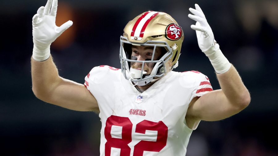 Ross Dwelley #82 of the San Francisco 49ers reacts after a touchdown during the first half of a game against the Arizona Cardinals at Estadio Azteca on November 21, 2022 in Mexico City, Mexico.